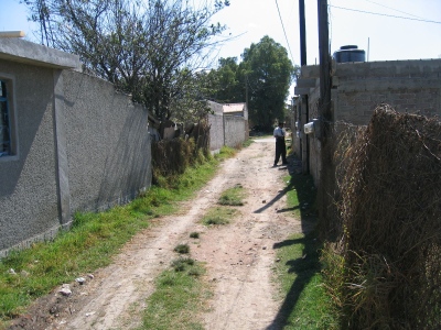 Photo of Elder Hernandez tracting in Mexico.