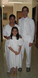Photo of Elder Willoughby ready to baptize two sisters