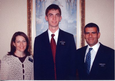 Photo of Mission President and his wife with Jake