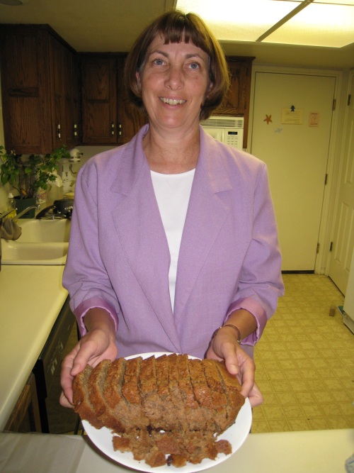 Jill offers her zucchini bread. Try some.