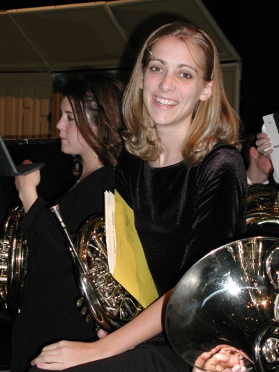 Sarah playing the French horn at a spring concert