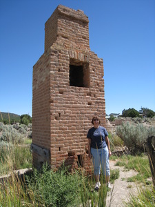 Jill standing by the remains of the furnace.