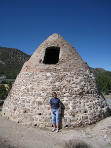 Jill standing by the rear of the kiln.