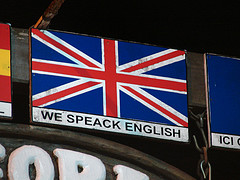 We Speack English sign.