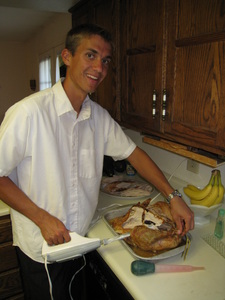Daniel carving the turkey.