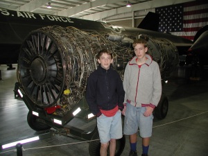 Jake and Paul by a jet engine.