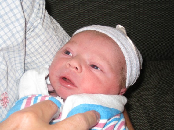 Jill holding Bryson at the hospital