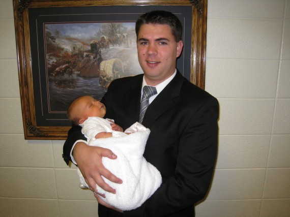 Derek and Bryson in the church foyer after the blessing