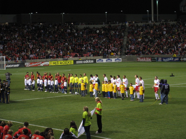 Real Salt Lake and New York Red Bulls before the crowd.