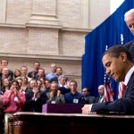 Barack Obama signs American Recovery and Reinvestment Act of 2009