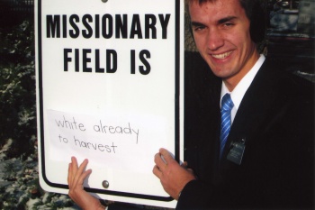 Dan making adjustments to sports field sign at MTC.