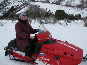 Jill with snowmobile at Mantua.