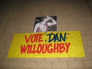 Vote Dan Willoughby poster on a wall of Davis High School