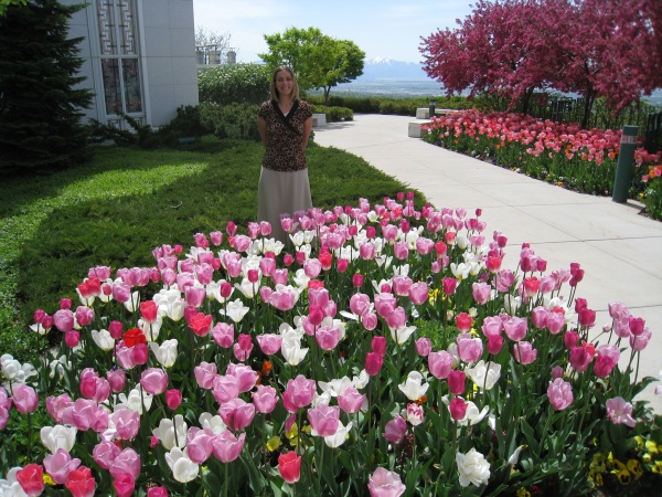 Sarah amongst the flowers at the Bountiful temple