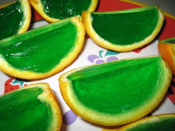 Closeup of the green Jell-O filled orange wedges
