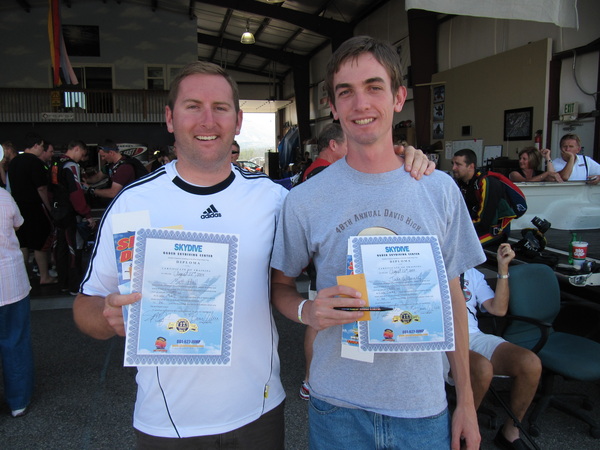 Matt and Jake receive skydiving certificates.