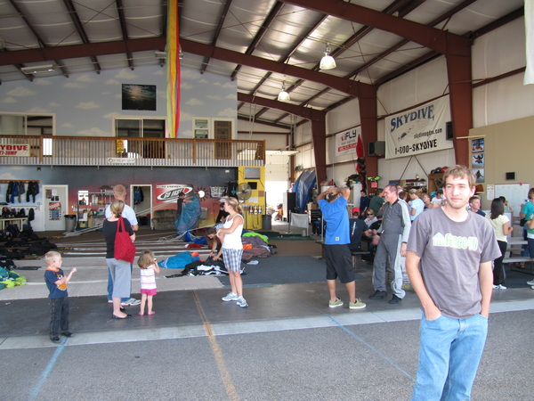 Paul, Jake's brother, waiting by the hangar.