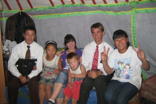 Daniel and his companion with a Mongolian family.