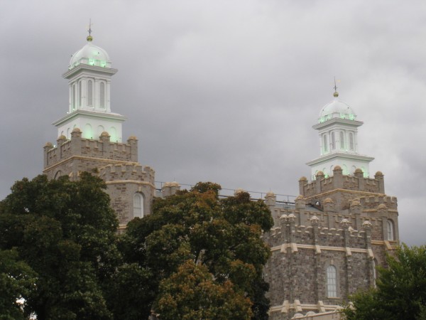 The exterior was originally painted an off-white color to hide the dark, rough-hewn limestone