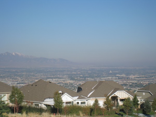 The Jordan River temple can be seen from the Draper temple in the valley below