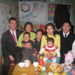 Daniel with member family in Mongolia Daniel (left) with a member family