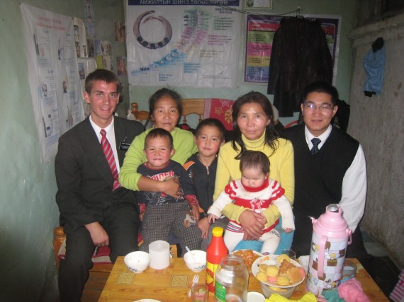 Daniel (left) with a member family
