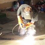 Paul practicing his arc-welding