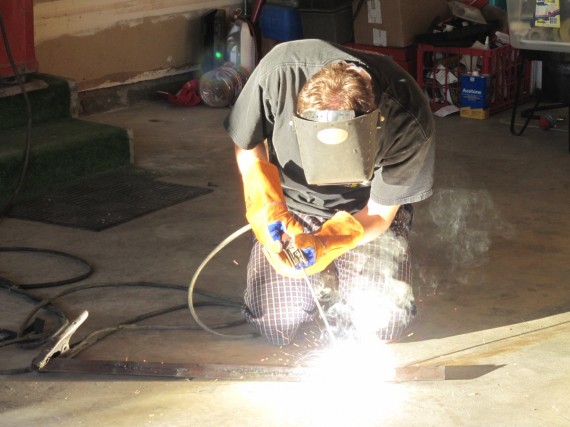 Paul practicing his arc-welding