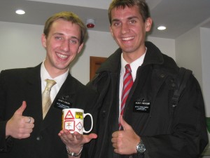 Daniel (right) with Elder Hansen receiving his cup.