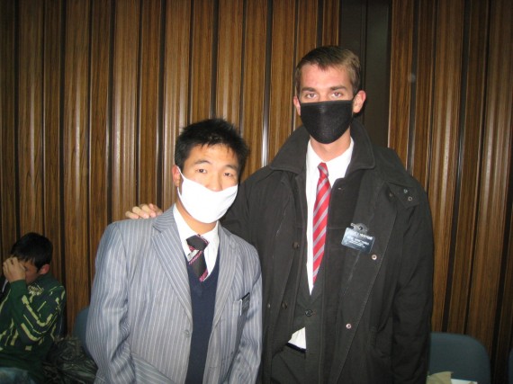 Munkh baatar and Daniel (right) wearing masks to church because of swine flu.