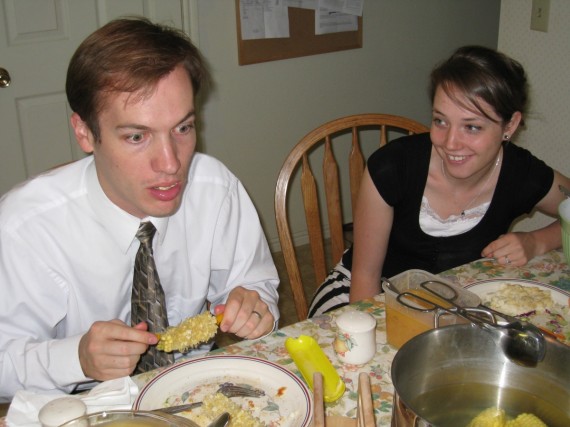 Steven and Adelaide eating corn