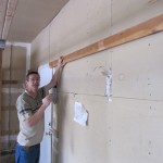 Rick installing the 2x4 shelf support Rick installing the 2x4 shelf support