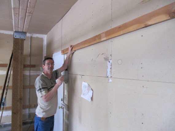 Rick installing the 2x4 shelf support