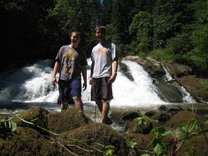 Elder Draper and Elder Willoughby by waterfall