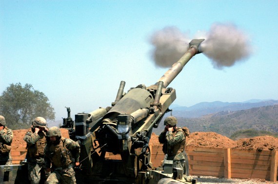 Firing a M-198 howitzer