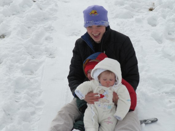 Adelaide, Aurora, and Cassandra sledding