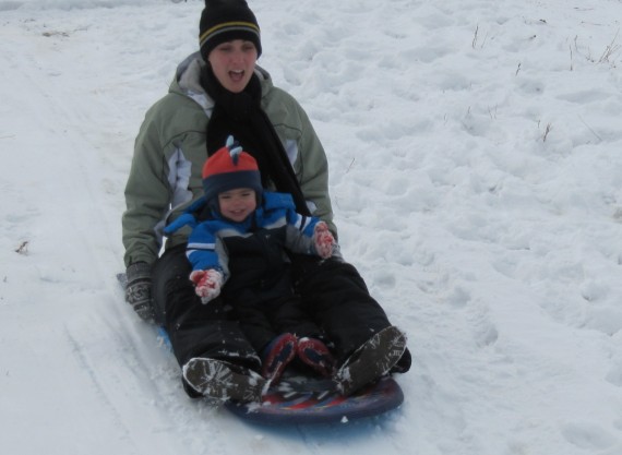 Sarah and Bryson sledding