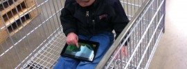 Bryson Playing Angry Birds on a Kindle Fire